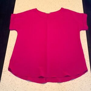 Pretty short sleeve loose blouse Enzo brand. Size medium